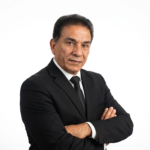 Professional headshot portrait in a corporate setting.