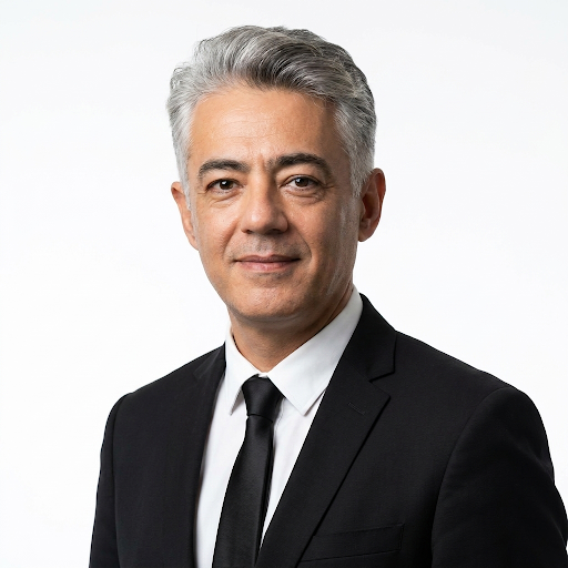 Professional headshot portrait in a corporate setting.