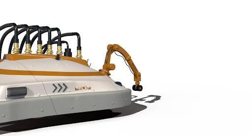 Wallbot robotic arm working on a structural surface.